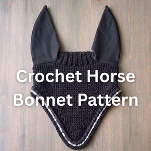 May include: A black crochet horse bonnet featuring two tall, solid black fabric ears and a textured, triangular crocheted front panel. The edges are trimmed with a decorative silver sequin cord. The text "Crochet Horse Bonnet Pattern" is visible.