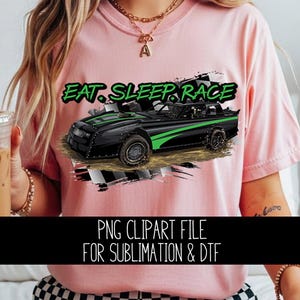 May include: Pink t-shirt featuring a black and green race car graphic with the text "EAT. SLEEP. RACE." Below the graphic is a black banner with the text "PNG CLIPART FILE FOR SUBLIMATION & DTF."