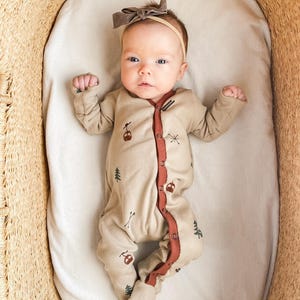 Skidmönstrat tyg på vetestickad ribbstickad ekologisk bomull för mysiga vinterkläder