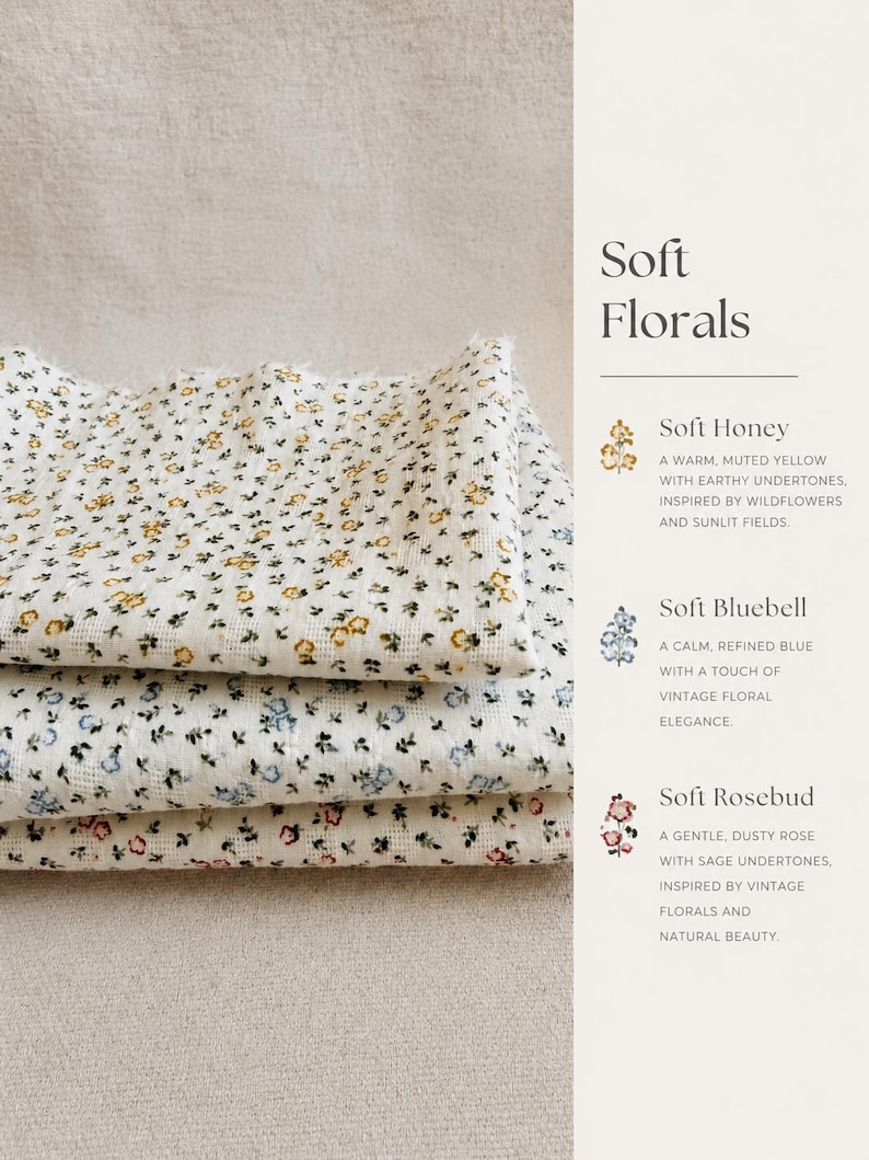 May include: Three folded pieces of white fabric with a small floral print. The top layer features yellow flowers, the middle layer has blue flowers, and the bottom layer displays pink flowers. Text on the right reads Soft Florals, Soft Honey, Soft Bluebell, and Soft Rosebud with descriptions.