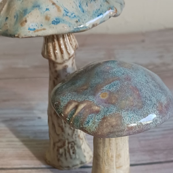 Pair of taller sized handmade ceramic mushrooms