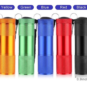 UV flashlight for glow in the dark badge reel charging. Black light, UV light for resin, nails, crafts, glow-in-the-dark powder, and urine.