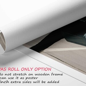 a roll of paper with a picture of a suitcase on it