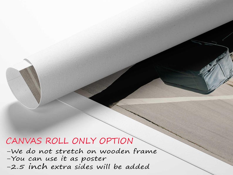 a roll of paper with a picture of a suitcase on it