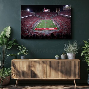 a football stadium with a large crowd of people