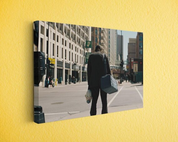 Man in Suit Holding Mask on City Street Canvas Print, Large Cinematic Wall Art for Living Room, Gritty Urban Home Decor, Heist Movie Scene