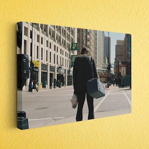 a picture of a person walking down a street