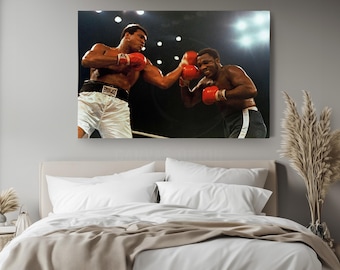 May include: A rectangular wall art print depicting a professional boxing match between two athletes. One athlete wears white trunks with an Everlast logo and red boxing gloves, while the other wears dark trunks and red gloves during a match.