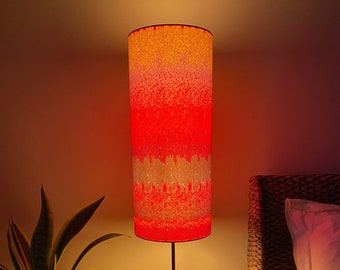 Single-sided lampshade - 48cm tall, 20cm diameter cylinder with  Ankara “Hellraiser” fabric