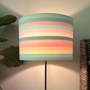 Double-sided 'Pride 2024' lampshade - 30cm diameter with plain white grey cotton fabric outer and Pride striped cotton fabric inner