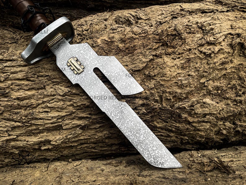 May include: A short sword with a patterned Damascus steel blade featuring a unique cutout design and a brass inlay near the hilt. The hilt has a metallic crossguard and a brown leather-wrapped handle, showcasing a distinct forged metal texture.