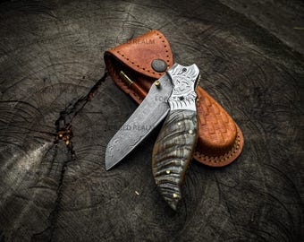 Handmade Damascus Steel Folding Knife, Ram Horn Handle, Engraved Bolster, Leather Sheath