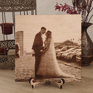 Custom wood family portrait with optional personal message engraved at no extra cost.