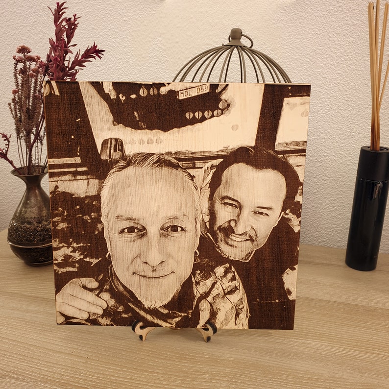 Eco-friendly wood burning technique showcasing detailed portraits for home decor.