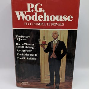 May include: A vintage book titled "P.G. Wodehouse: Five Complete Novels." The cover is red and black, featuring the author's name in white and a depiction of a butler. The book includes titles like "The Return of Jeeves" and "Spring Fever."