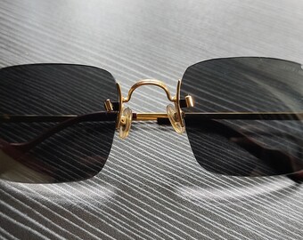 Vintage cartier rimless C decor 22-135