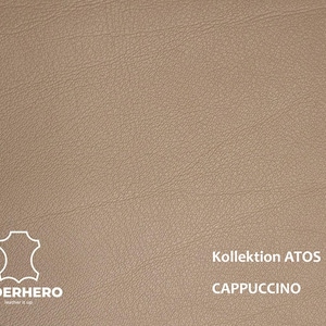 May include: Close-up of a textured, light brown leather material. The image includes the text "Kollektion ATOS" and "CAPPUCCINO". The logo for LEDERHERO is in the lower left corner.