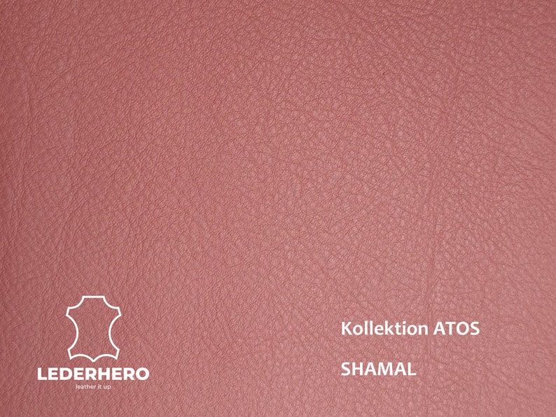 May include: A close-up of a textured, pink leather fabric. The fabric is labelled "Kollection ATOS SHAMAL".