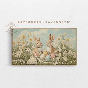 May include: Two brown bunnies sitting in a field of white daisies and green grass. The bunnies are surrounded by colourful Easter eggs. The text "PAY 3 & GET 5 • PAY 5 & GET 10" is at the top of the image.
