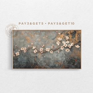 May include: A framed painting of a delicate branch of white cherry blossoms with pink centres, set against a textured background of grey and gold. The text "PAY 3 & GET 5 • PAY 5 & GET 10" is displayed above the painting.