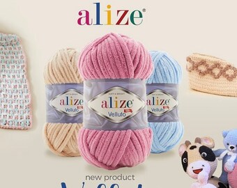 May include: Three skeins of yarn in pink, light blue, and beige. The yarn is soft and fluffy and is labeled "Alize Velluto". The yarn is a new product and is perfect for crocheting or knitting baby blankets, toys, and other projects.
