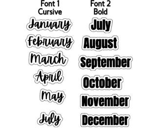 May include: A collection of black text labels representing months of the year, organized into two columns. The left column features cursive script for January, February, March, April, May, and July. The right column displays bold block lettering for July, August, September, October, November, and December.