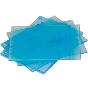 May include: A stack of clear blue acrylic sheets with text in German and English. The text reads "S&reg; is a registered trademark of  hm GmbH Darmstadt, Germany 07823-ordin".