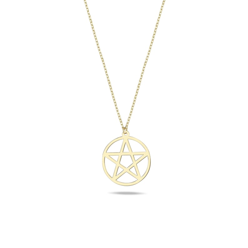 Simple and elegant gold pentagram necklace on a fine chain, isolated on a white background to emphasize the geometric design of the pendant.