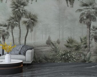 May include: A living room scene featuring a gray sofa, a round coffee table, and a tropical mural. The mural depicts palm trees and lush greenery in muted green tones. A vase of yellow flowers adds a pop of color.