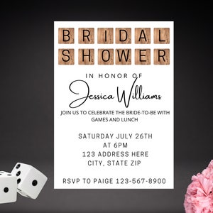 May include: A white invitation with black text for a bridal shower. The invitation features a wood-grain background with the words "BRIDAL SHOWER" in black letters. The invitation is for Jessica Williams and includes the date, time, and location of the event. RSVP information is also included.