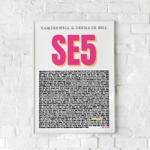 May include: A white poster with the text "CAMBERWELL & DENMARK HILL" and "SE5" in large pink letters. The poster lists street names in black text.