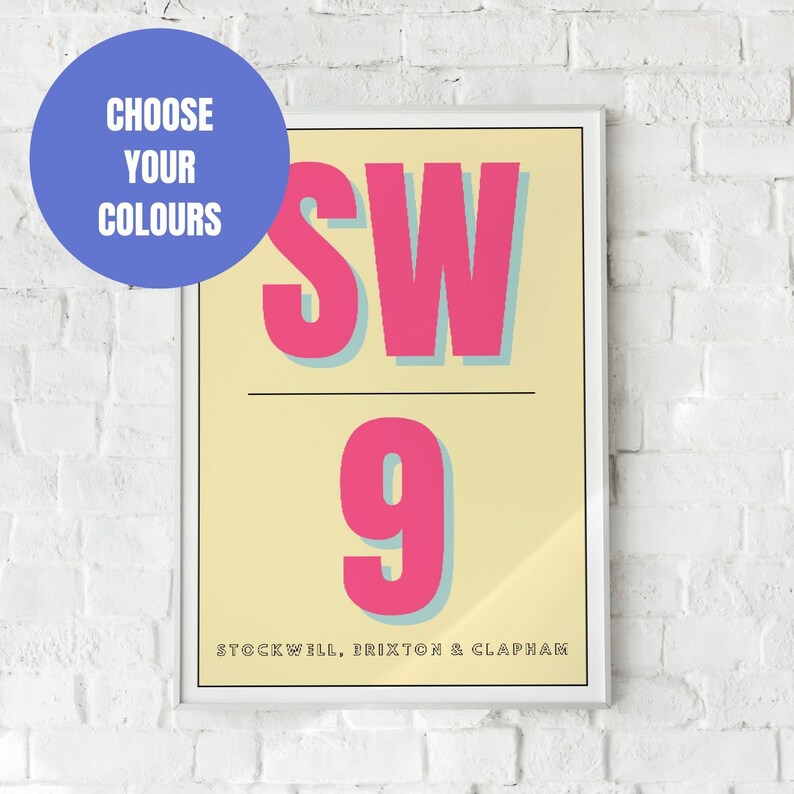 May include: A framed print with a yellow background and pink text. The text reads "SW9" and "STOCKWELL, BRIXTON & CLAPHAM".