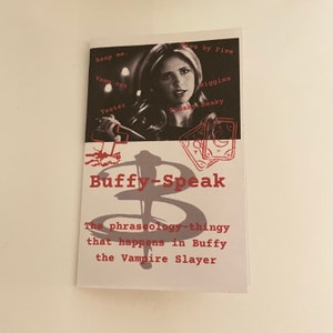 May include: A white card with a red and grey Buffy the Vampire Slayer logo. The card has the text "Buffy-Speak" and "The phraseology-thingy that happens in Buffy the Vampire Slayer". A photo of Sarah Michelle Gellar as Buffy Summers is in the background.