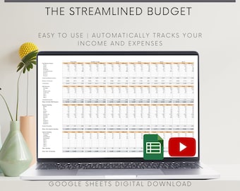 May include: A laptop computer displaying a Google Sheets spreadsheet titled "The Streamlined Budget". The spreadsheet is designed to track income and expenses. The text "EASY TO USE | AUTOMATICALLY TRACKS YOUR INCOME AND EXPENSES" is displayed above the spreadsheet. The text "GOOGLE SHEETS DIGITAL DOWNLOAD" is displayed below the laptop.
