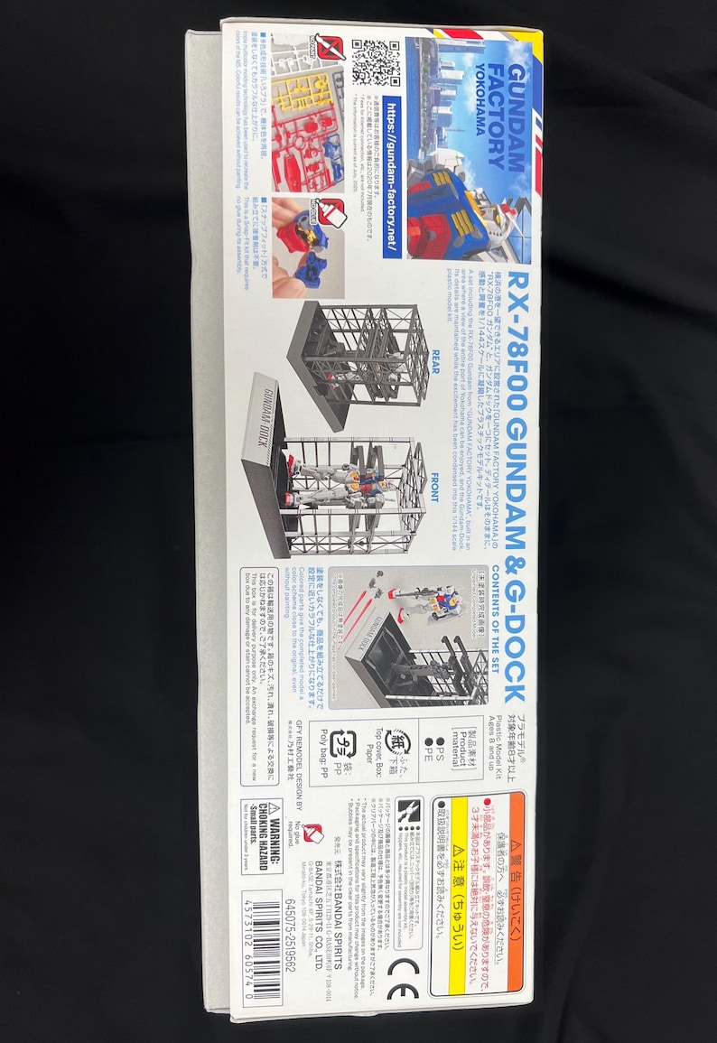 Puede incluir: Caja del kit de modelo RX-78F00 Gundam & G-Dock. La caja presenta im&aacute;genes del modelo y sus componentes, con texto en japon&eacute;s e ingl&eacute;s. El kit incluye un modelo de pl&aacute;stico y G-Dock.