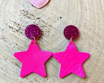 Neon pink star earrings