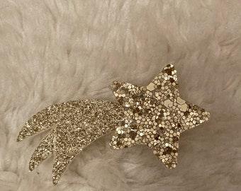 Gouden glitter broche met vallende ster