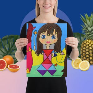 May include: A colorful abstract painting of a girl with brown hair and blue eyes. She is wearing a pink, blue, and purple geometric dress. The background is a blue sky with yellow and green accents.