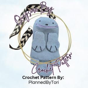 May include: A light blue crochet bag shaped like a cartoon character, with a black and white patterned strap. The bag has a smiling face and small arms. Text on the image reads "Quagsire Bag Crochet Pattern" and "Crochet Pattern By: PlannedByTori."