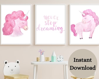 May include: Three printable wall art prints featuring pink watercolour unicorns. The centre print has the text "never stop dreaming" in pink script.