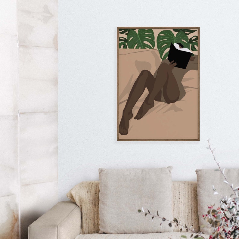 May include: A digital illustration of a person reading a book while lying on a bed with tropical leaves in the background.