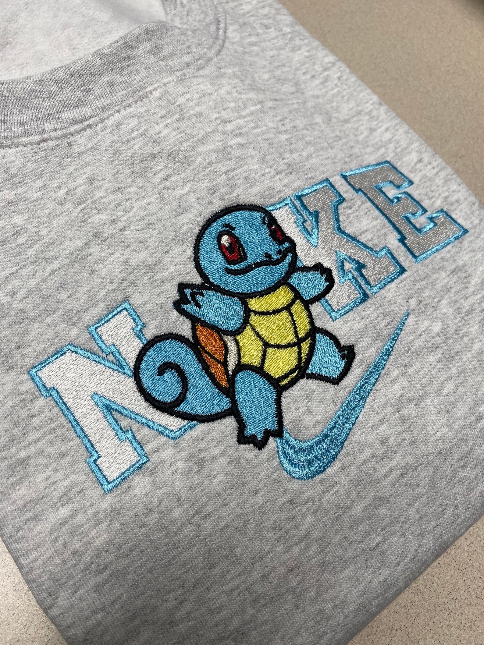 Nike pokemon squirtle embroidered crewneck  etsy