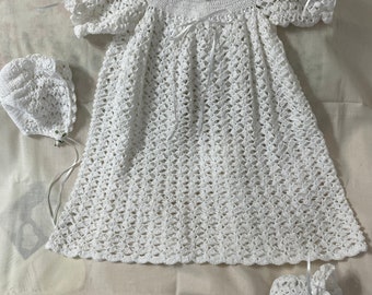 Crocheted white christening gown with hat booties