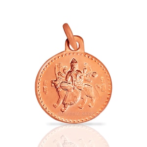 May include: A copper-coloured circular pendant featuring a detailed relief of a deity riding an animal. The pendant has a loop at the top for a chain. The text "OM POOJA SHOP" is visible at the bottom.