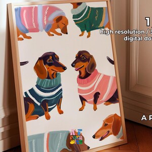 May include: Digital download of a printable art print featuring four dachshunds wearing sweaters. The dachshunds are illustrated in a whimsical style with bright colors. The print is labeled "A Ratio" and "1 jpg, high resolution / 300 DPI, digital download".