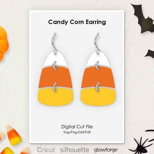 May include: Candy corn earrings with white, orange, and yellow stripes. The earrings are made of a digital cut file and can be used with Cricut, Silhouette, or Glowforge.
