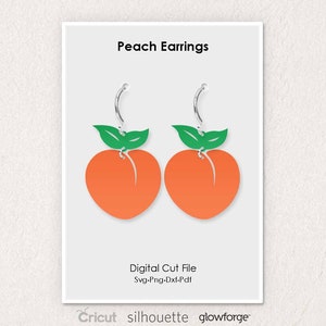 May include: Peach earrings with silver hoops and green leaves. Digital cut file for Cricut, Silhouette, and Glowforge. Svg-Png-Dxf-Pdf.