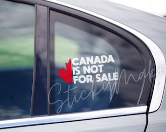 May include: A white vinyl sticker with a red maple leaf and the text "CANADA IS NOT FOR SALE" on a car window.