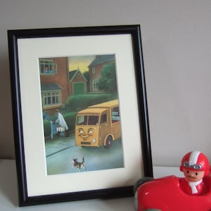 May include: A framed illustration of a yellow delivery van with a smiling face driving down a street with a cat running in front of it. The van has a sign that says "Milk" and is filled with bottles of milk.