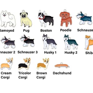 May include: A set of 12 enamel dog charms, each featuring a different breed. The charms are silver-toned and have a black outline. The breeds include Samoyed, Pug, Boston Terrier, Poodle, Schnauzer, Husky, Shiba Inu, and Corgi.